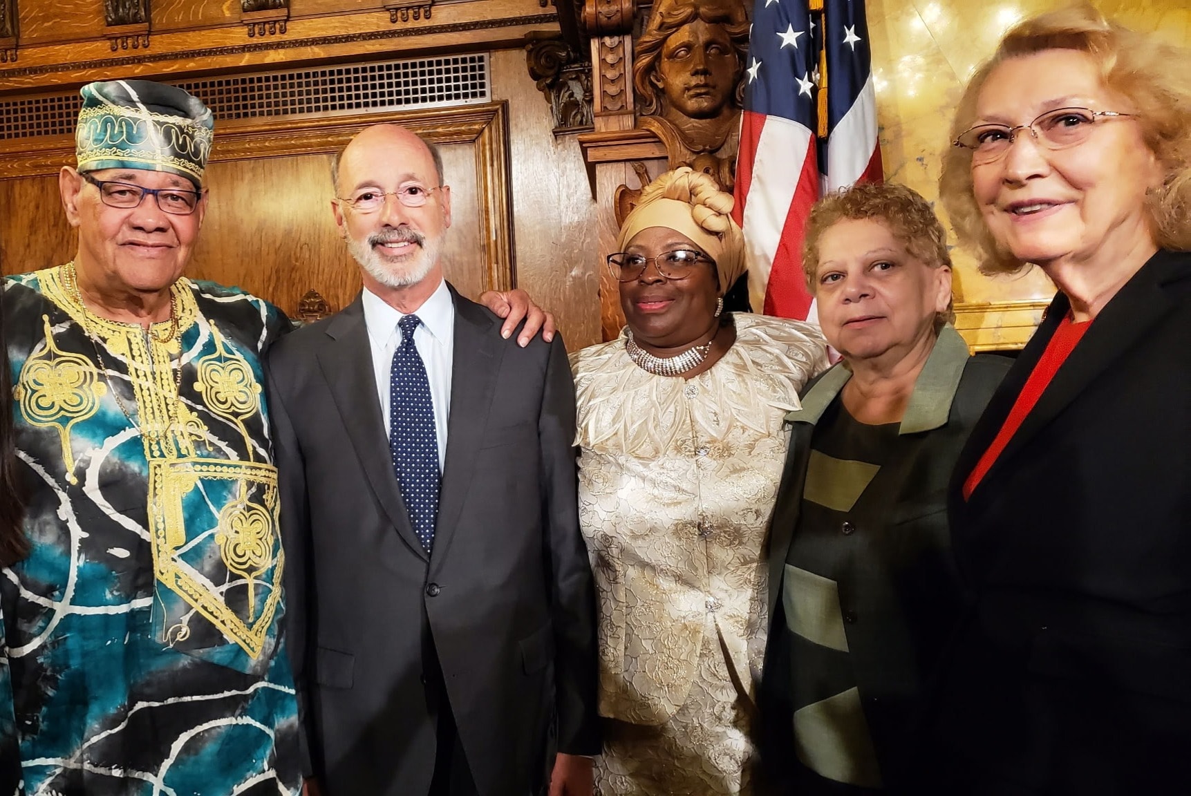 Stan Lawson, Governor Tom Wolf, and Representative Sue Helm with community members at the Act 9 of 2019 signing ceremony